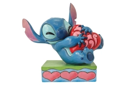 Stitch Hugging a Heart Figurine - Disney Traditions 6014316